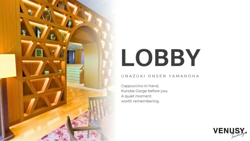 Wooden lattice design framing the Kurobe Gorge view in the Unazuki Yamanoha lobby